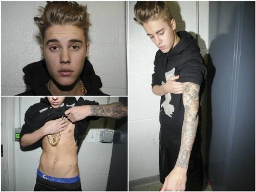 Justin Bieber posa para fotos mostrando suas tatuagens